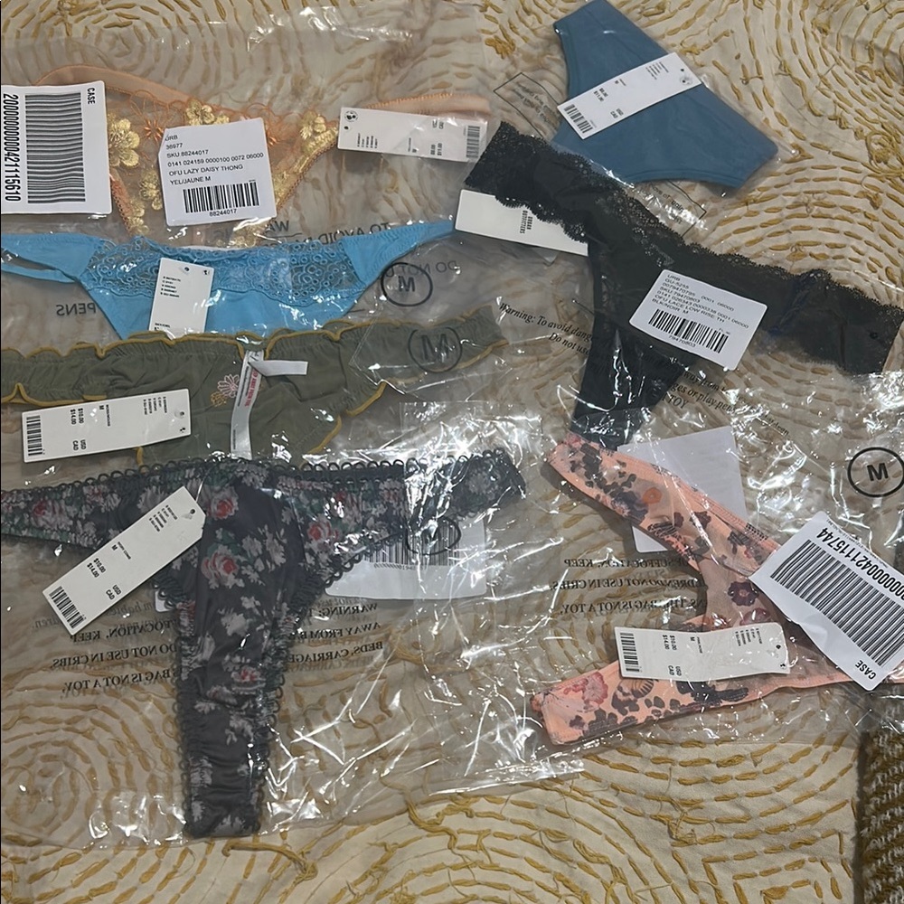 7 Assorted urban outfitters Lace and Floral Thongs